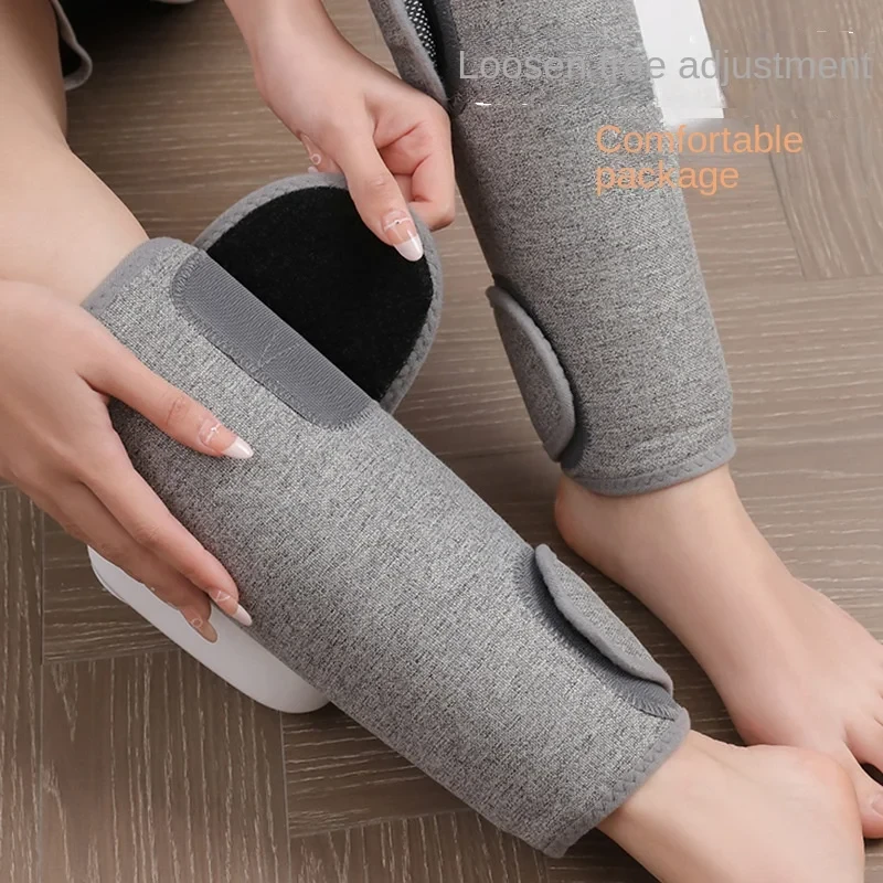 Hands securing the overlapping wrap closure around a calf